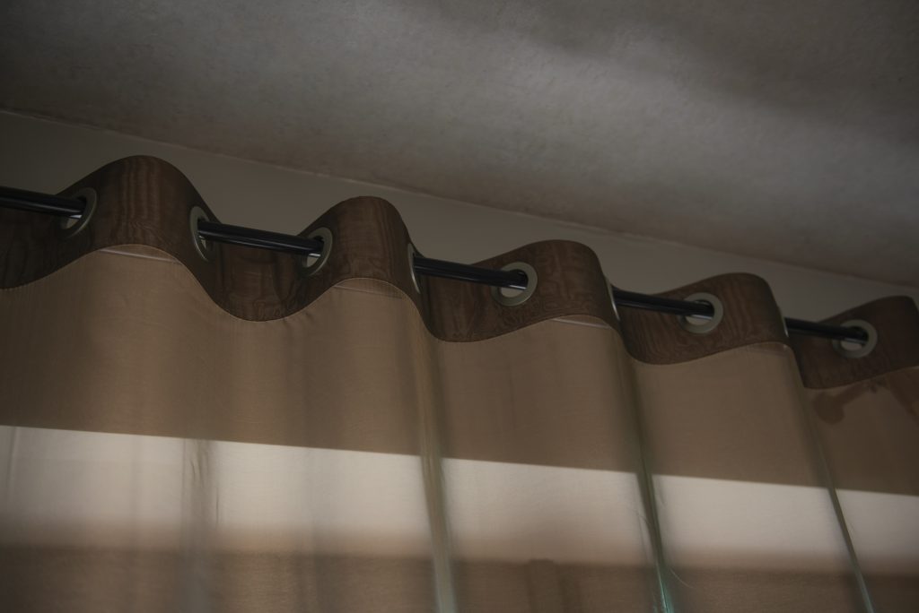 7 Penyebab Gorden Mudah Rusak dan Bagaimana Cara Mengatasinya 6 creative background with curtain shadow from window